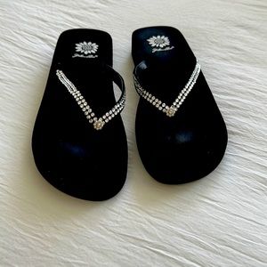 Black rhinestone flip flops.  Brand is Yellowbox